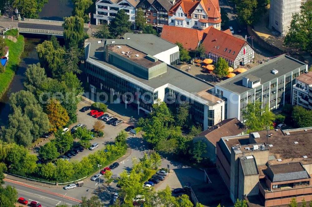 Bünde from above - Town Hall building of the city administration infornt of the restaurante Toro Blanco in Buende in the state North Rhine-Westphalia
