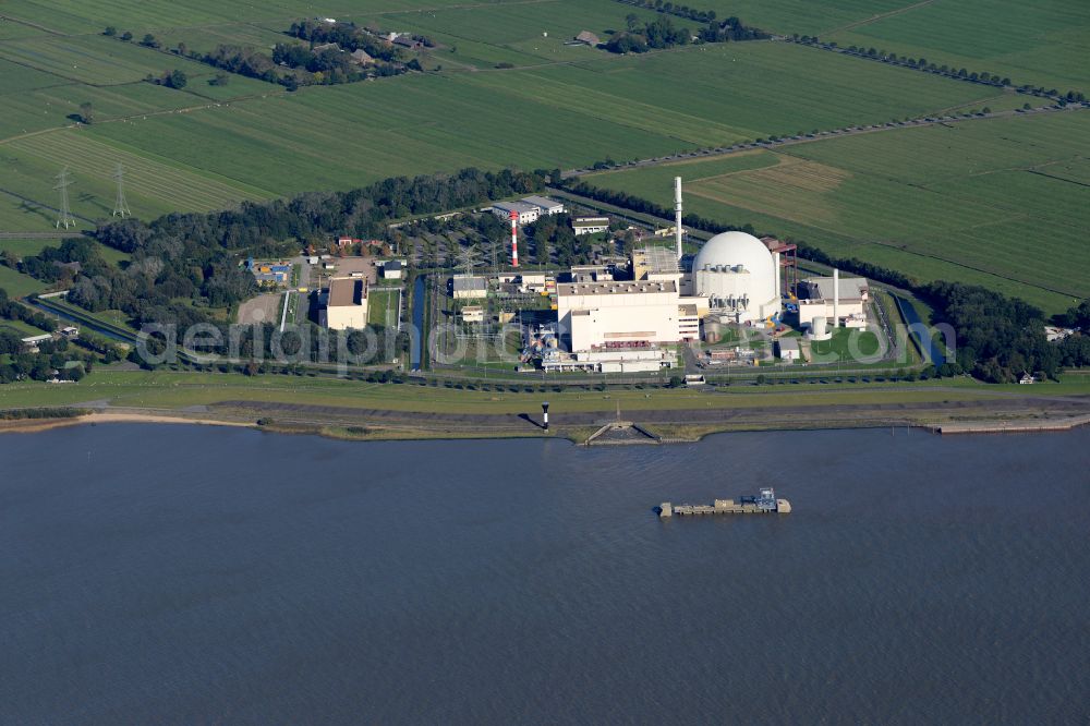 Brokdorf from above - Building the decommissioned reactor units and systems of the NPP - NPP nuclear power plant on elbe river in Brokdorf in the state Schleswig-Holstein, Germany