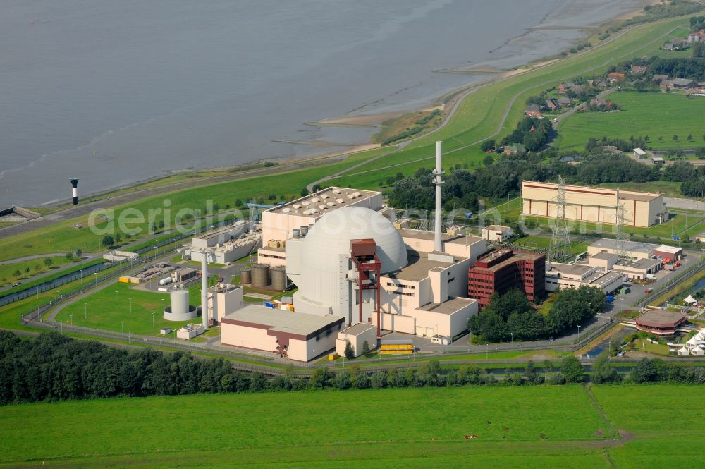 Brokdorf from the bird's eye view: Building the decommissioned reactor units and systems of the NPP - NPP nuclear power plant on elbe river in Brokdorf in the state Schleswig-Holstein, Germany