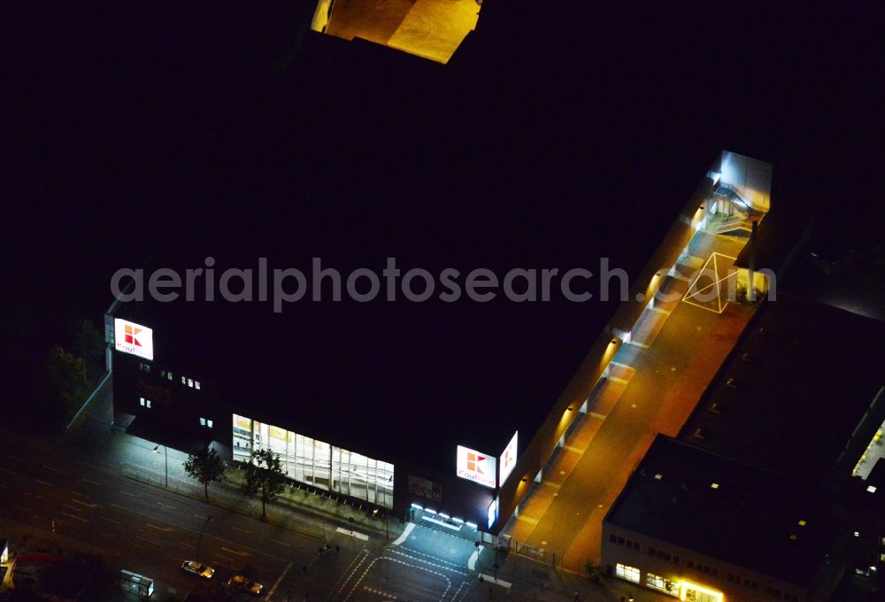 Berlin from the bird's eye view: Night image wieth a view over the supermarket Kaufland at the Gutschmidtstrasse in Britz in the district Neukoelln in Berlin