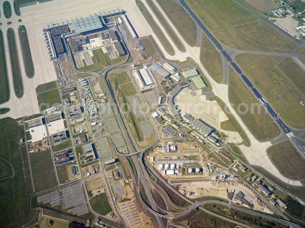 Aerial photograph Schönefeld - Several buildings and terminals on the premises of the airport BER along the Schoenefelder Allee in Schoenefeld in the state Brandenburg