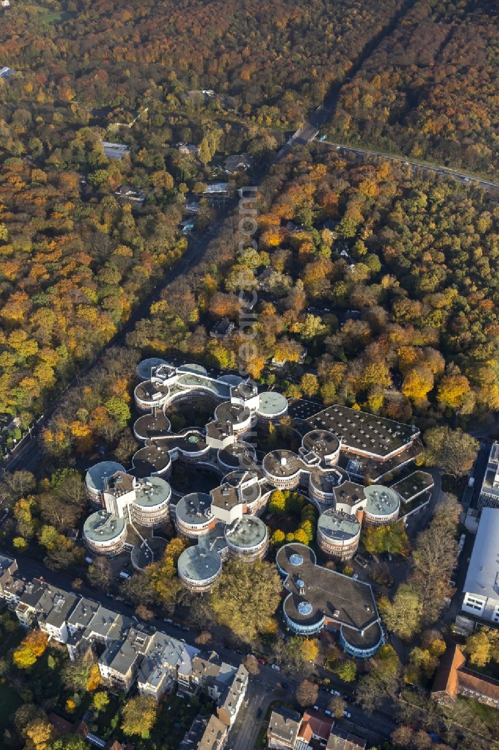 Duisburg from the bird's eye view: Building of the University of Duisburg-Essen in autumn forest in the Ruhr area in North Rhine-Westphalia