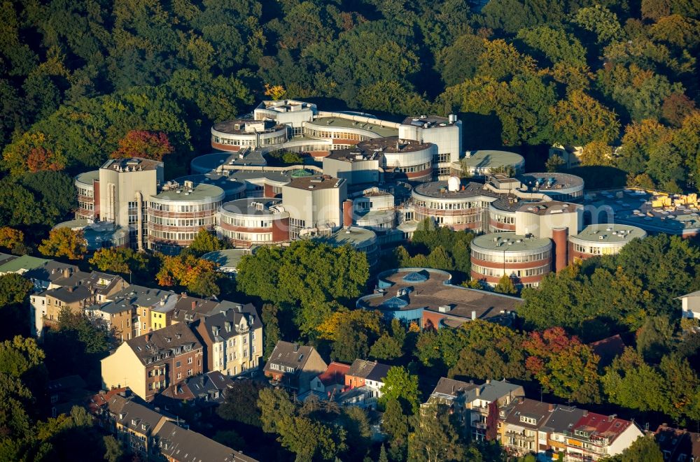 Duisburg from the bird's eye view: Building of the University of Duisburg-Essen in autumn forest in the Ruhr area in North Rhine-Westphalia