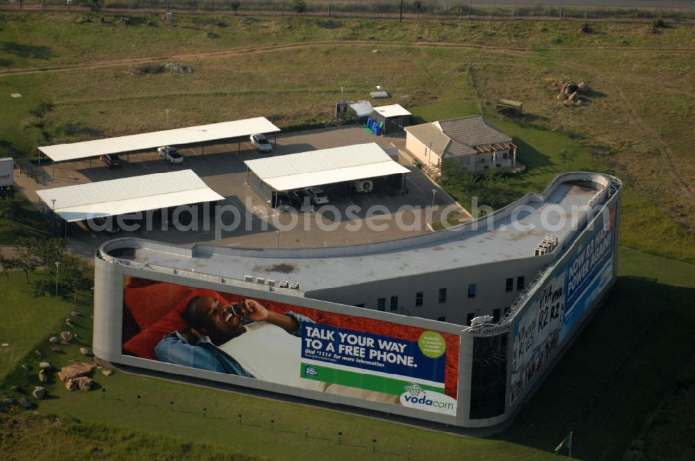 Johannesburg from the bird's eye view: View of the building of Vodacom in the industrial area at the Buccleuch Interchange in Johannesburg, South Africa. Vodacom is a South African mobile telecommunications company which is owned one half each by Vodafone and Telkom