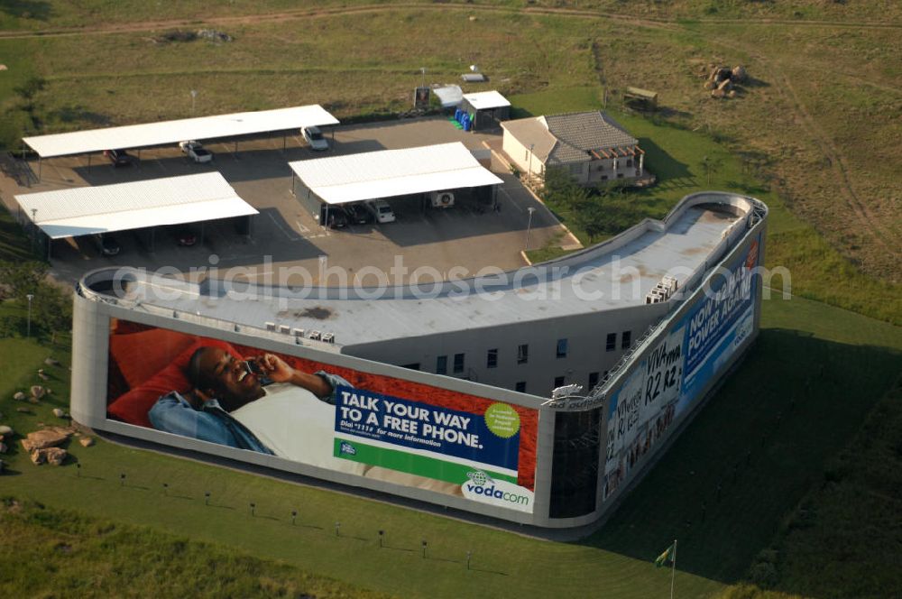 Aerial image Johannesburg - View of the building of Vodacom in the industrial area at the Buccleuch Interchange in Johannesburg, South Africa. Vodacom is a South African mobile telecommunications company which is owned one half each by Vodafone and Telkom