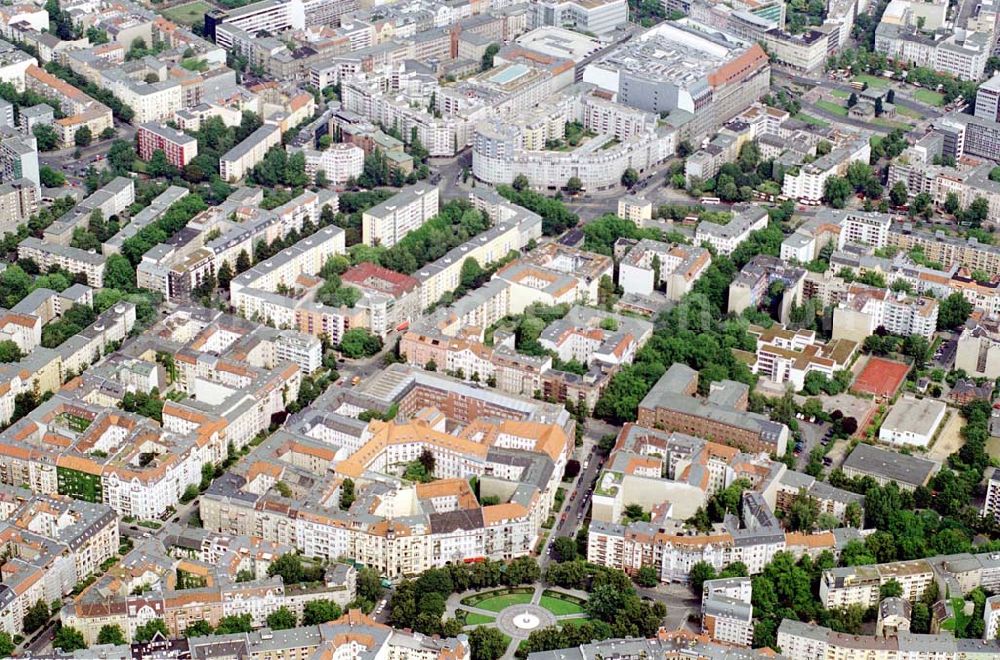 Berlin / Chralottenburg from the bird's eye view: Gebäudeensemble Ansbacher Carreé Vordergrund: Viktoria-Luise-Platz Hintergrund:Wittenbergplatz/KaDeWe, Gedächniskirche/Europa-Center Charlottenburg / Berlin