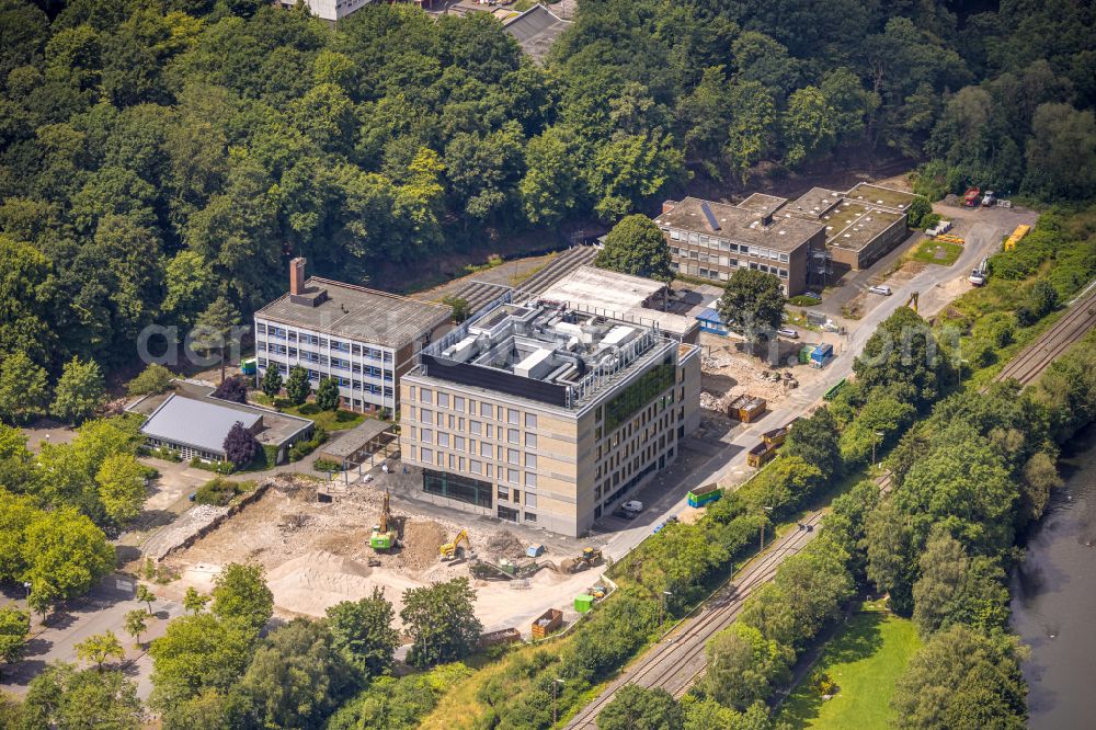 Aerial image Arnsberg - Building complex of the Vocational School Berufskolleg f. Wirtschaft u. Verwaltung HSK entlong on Schienengleisen in Arnsberg in the state North Rhine-Westphalia, Germany