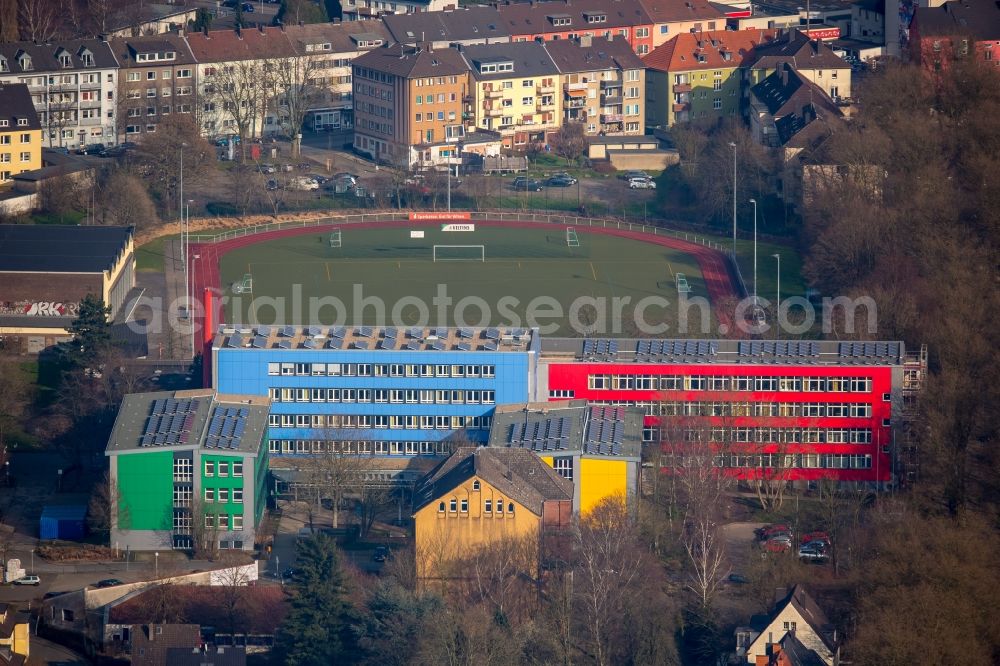 Witten from the bird's eye view: Colourful building complex of the Vocational School Berufskolleg Witten with the sports Complex Fritz Husemann Sports Field in Witten in the state North Rhine-Westphalia