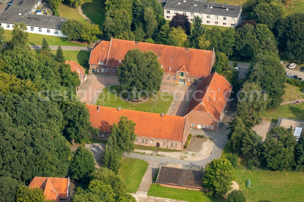 Bedburg-Hau from the bird's eye view: Building complex of the vocational school LVR-Paul-Moor-Schule a school for patients and sick children at the street Suedlicher Rundweg in Bedburg-Hau in the state of North Rhine-Westphalia, Germany