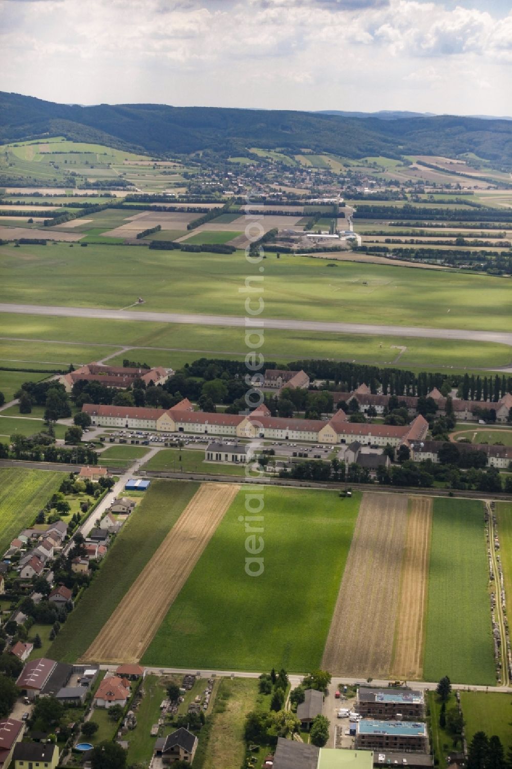 Langenlebarn from the bird's eye view: Building complex of the austria army - Bundeswehr military barracks on the airfield in Langenlebarn in Lower Austria, Austria