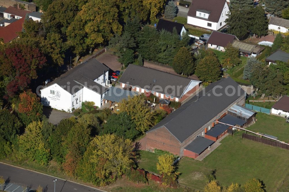 Aerial photograph Werneuchen - Complex of the hotel, restaurant and event barn Annenhof in Werneuchen in the state of Brandenburg. The complex is located on Freienwalder Street