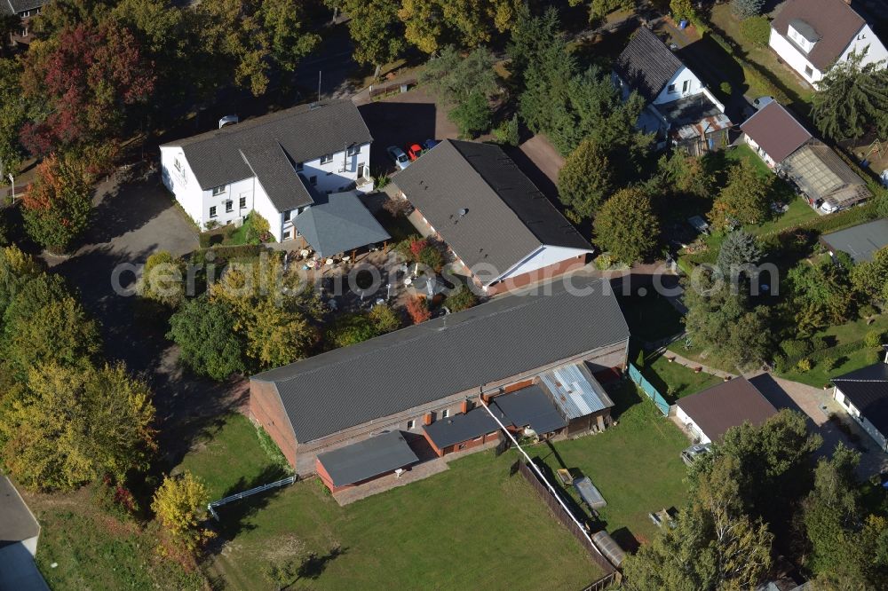 Werneuchen from the bird's eye view: Complex of the hotel, restaurant and event barn Annenhof in Werneuchen in the state of Brandenburg. The complex is located on Freienwalder Street