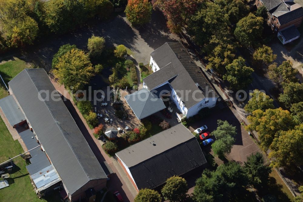 Aerial image Werneuchen - Complex of the hotel, restaurant and event barn Annenhof in Werneuchen in the state of Brandenburg. The complex is located on Freienwalder Street