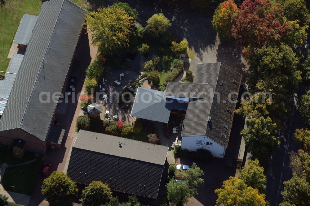 Werneuchen from the bird's eye view: Complex of the hotel, restaurant and event barn Annenhof in Werneuchen in the state of Brandenburg. The complex is located on Freienwalder Street