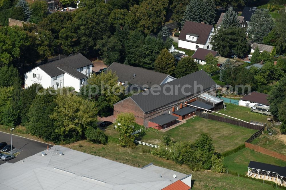 Werneuchen from above - Complex of the hotel, restaurant and event barn Annenhof in Werneuchen in the state of Brandenburg. The complex is located on Freienwalder Street