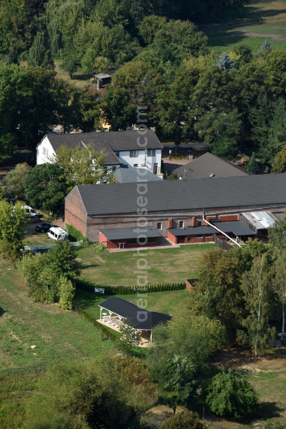 Aerial image Werneuchen - Complex of the hotel, restaurant and event barn Annenhof in Werneuchen in the state of Brandenburg. The complex is located on Freienwalder Street