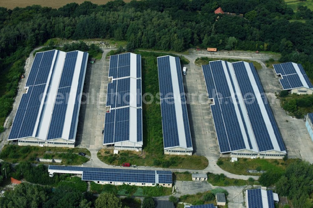 Aerial photograph Alaunwerk - Complex and former munitions depots of Intent with photovoltaic solar systems warehouse building of the former barracks in Heide Alaunwerk in Saxony