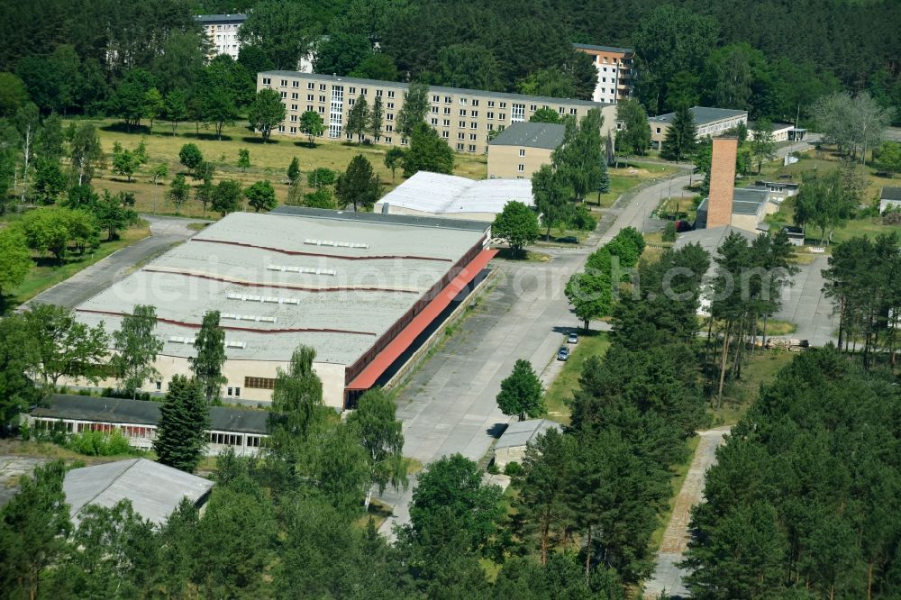 Damsdorf from the bird's eye view: Complex of buildings of the former armed forces the military barracks in village Dams in the federal state Brandenburg, Germany