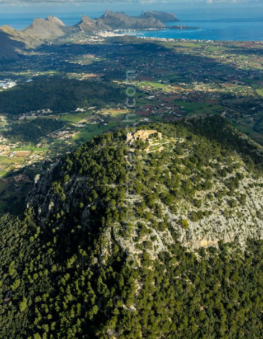 Aerial photograph Pollensa - Building complex of the former monastery and today hostel Santuari de la Mare de Deu del Puig in Pollensa in Islas Baleares, Spain