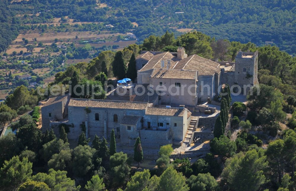 Aerial image Pollença - Building complex of the former monastery Son Puig de Maria and today hostel and restaurant at Pollenca Mallorca in Balearic Islands, Spain