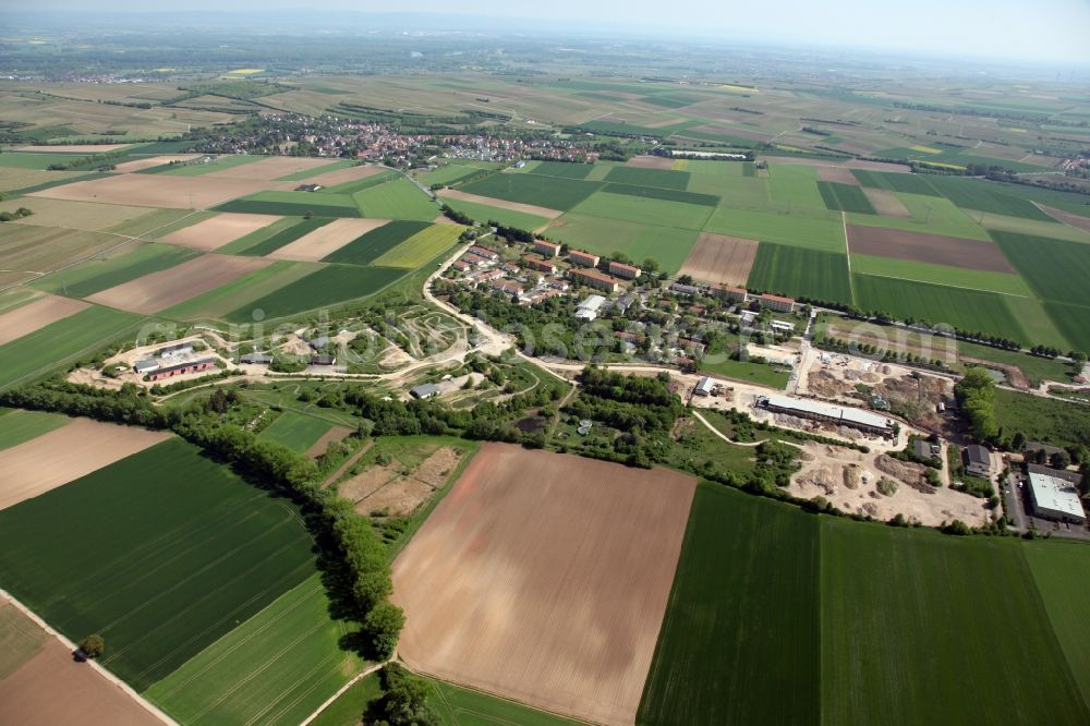 Aerial photograph Nierstein - Building complex of the former military barracks US Army Anderson Barracks Dexheim in Nierstein in the state Rhineland-Palatinate. Currently, the site is being converted into a Rhein-Selz-Park. Among other things, an off-road test track is to be created here. The terrain could thus become a large leisure residence