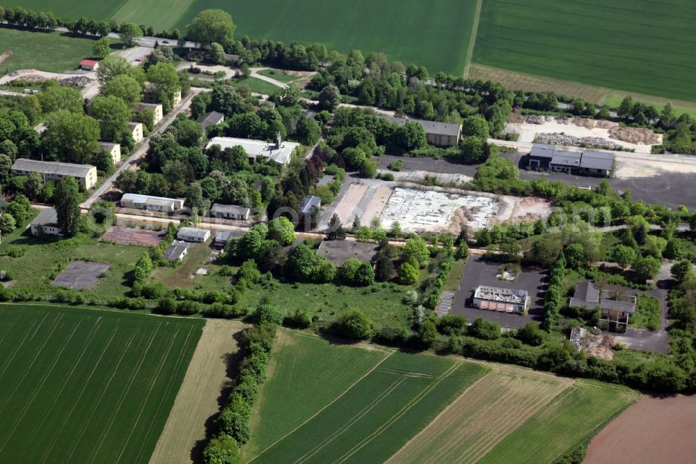 Nierstein from above - Building complex of the former military barracks US Army Anderson Barracks Dexheim in Nierstein in the state Rhineland-Palatinate. Currently, the site is being converted into a Rhein-Selz-Park. Among other things, an off-road test track is to be created here. The terrain could thus become a large leisure residence