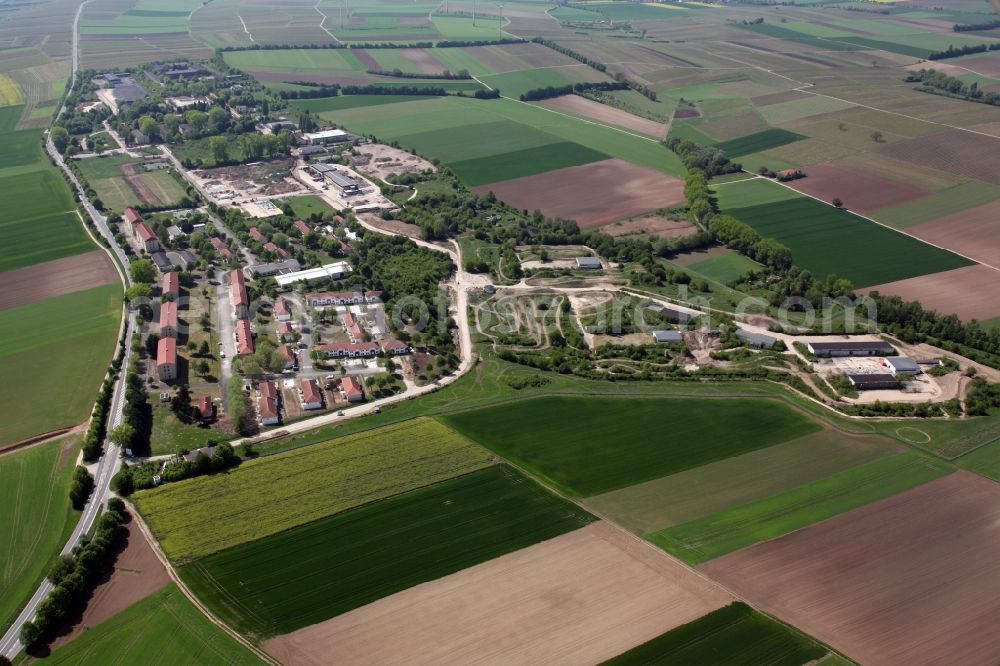 Nierstein from the bird's eye view: Building complex of the former military barracks US Army Anderson Barracks Dexheim in Nierstein in the state Rhineland-Palatinate. Currently, the site is being converted into a Rhein-Selz-Park. Among other things, an off-road test track is to be created here. The terrain could thus become a large leisure residence