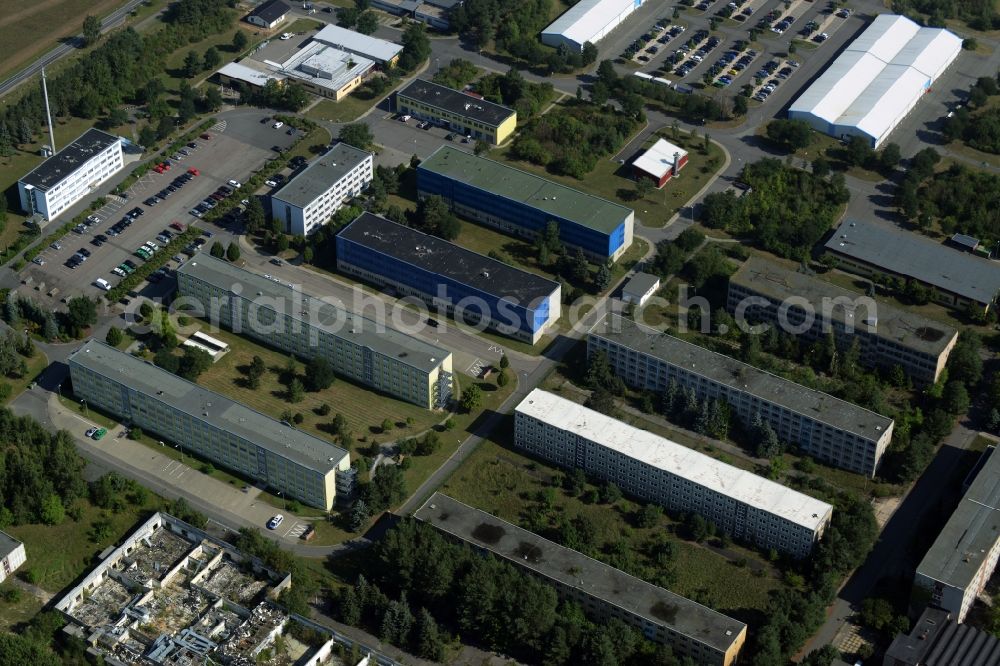 Aerial image Bad Düben - Building complex of the former military barracks in Bad Dueben in the state of Saxony. The buildings are located on Durchwehnaer Strasse in the East of the town and include sports facilities and companies.