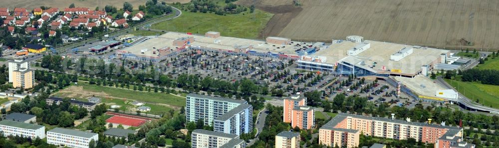 Ahrensfelde from above - Building complex of the shopping center KaufPark Eiche der Unibail-Rodamco Germany GmbH in Ahrensfelde in the state Brandenburg