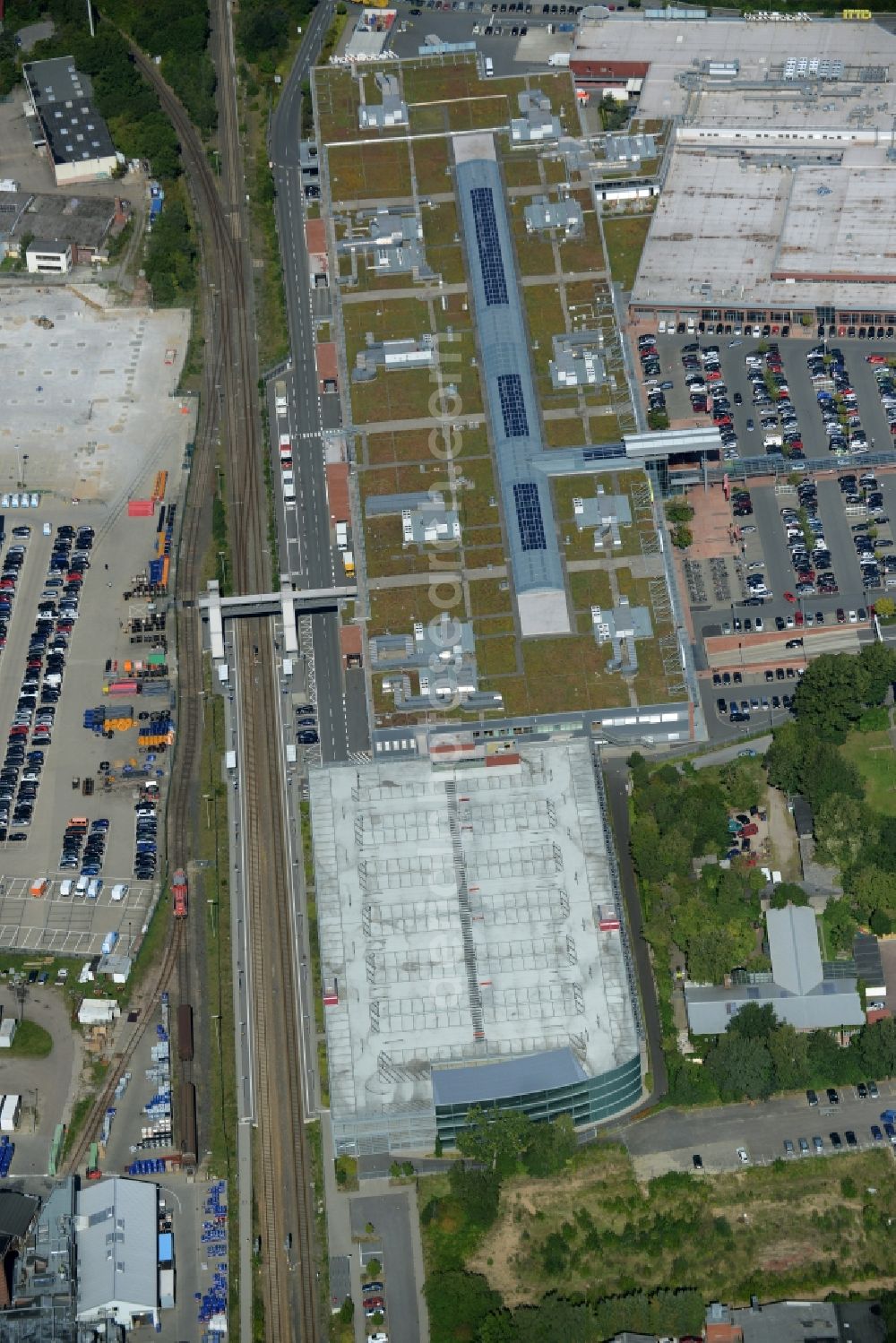 Kiel from the bird's eye view: Building complex of the shopping mall Citti-Park in Kiel in the state of Schleswig-Holstein. The shopping mall is located right at the train station Kiel-Hassee CITTI-PARK and includes a parking lot