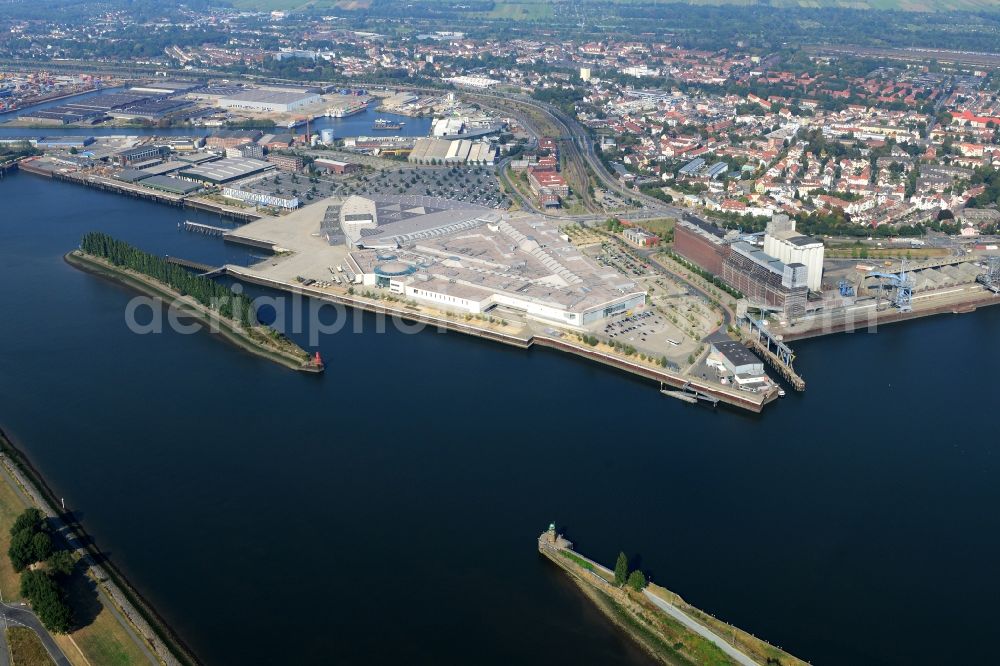 Aerial image Bremen - Building complex of the shopping mall Waterfront on the riverbank of the Weser in Bremen in Germany