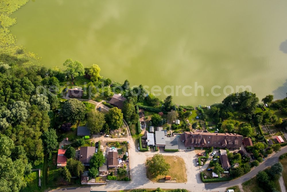 Wokuhl-Dabelow from above - Complex of the hotel building Seeidyll Comthurey between the lakes Kleiner and Grosser Gadowsee in Wokuhl-Dabelow in the state of Mecklenburg - Western Pomerania