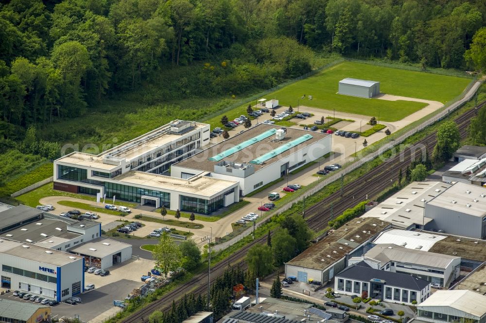 Aerial image Erkrath - Building complex and company compound of Seco Tools in Erkrath in the state of North Rhine-Westphalia. The compound with the glas facade and green roof is located on railway tracks in the West of the town