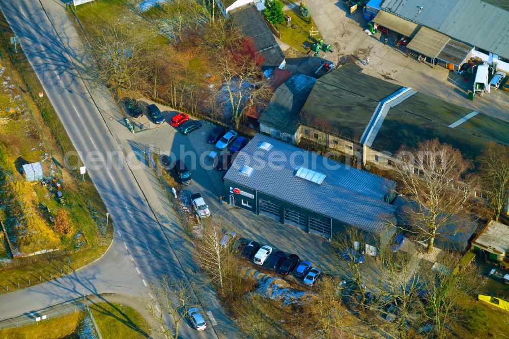 Bernau from the bird's eye view: Building complex and grounds of the automotive repair shop AUTOFIT WOTSCHKE on Ruednitzer Chaussee in Bernau in the state Brandenburg, Germany