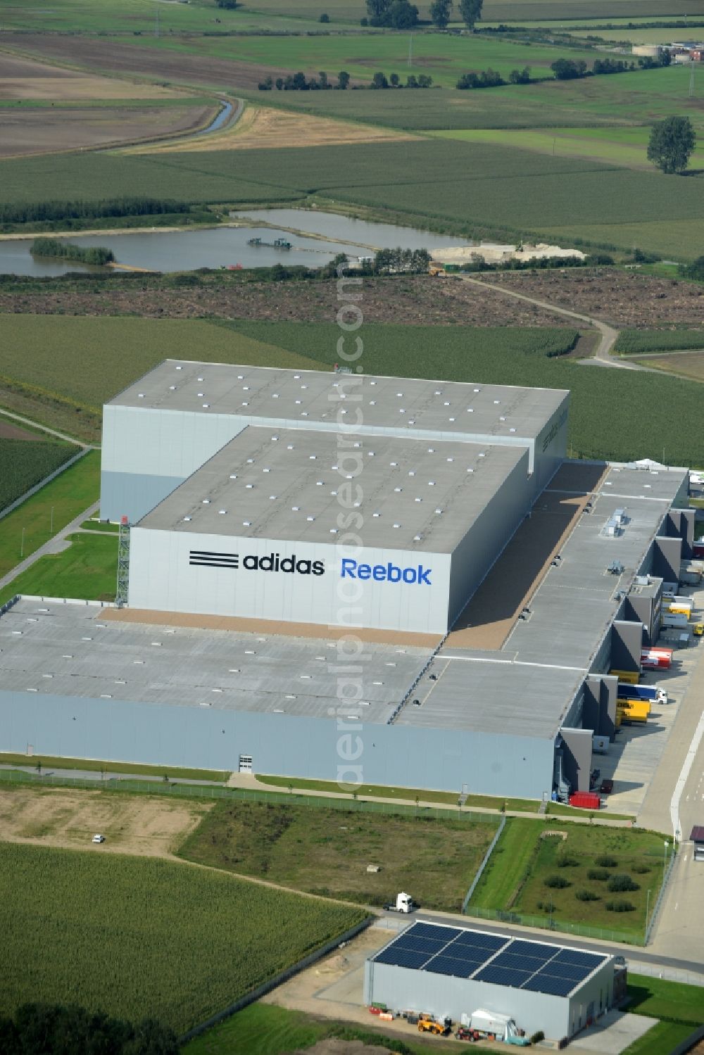 Aerial image Rieste - Building complex and grounds of the logistics center adidas Reebok in the industrial area Niedersachsenpark in Rieste in the state Lower Saxony