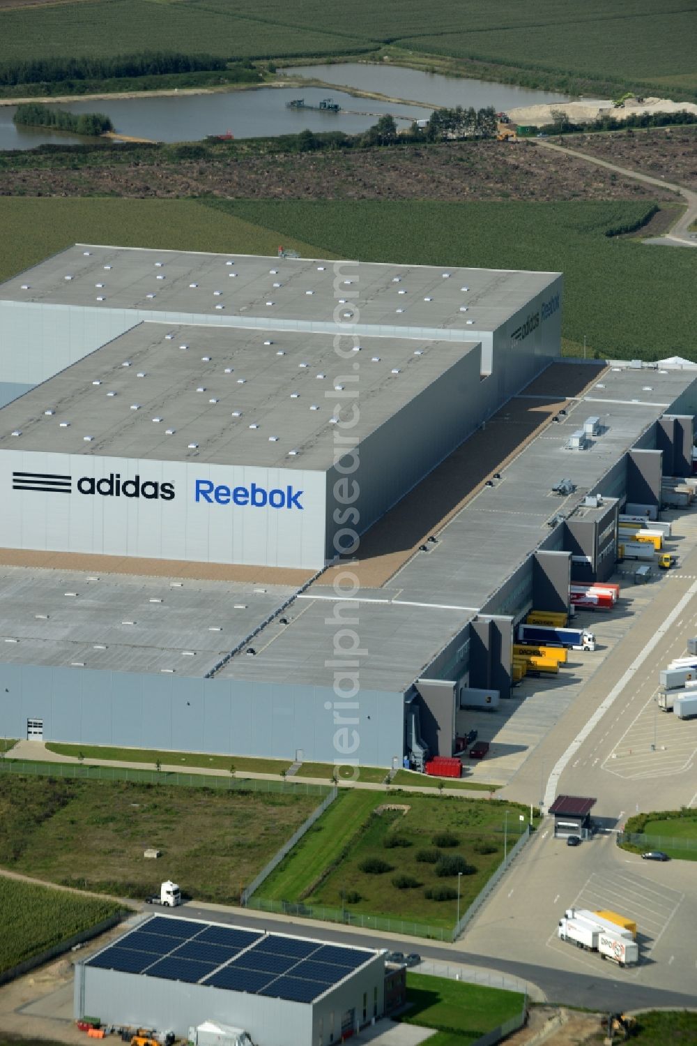 Rieste from above - Building complex and grounds of the logistics center adidas Reebok in the industrial area Niedersachsenpark in Rieste in the state Lower Saxony