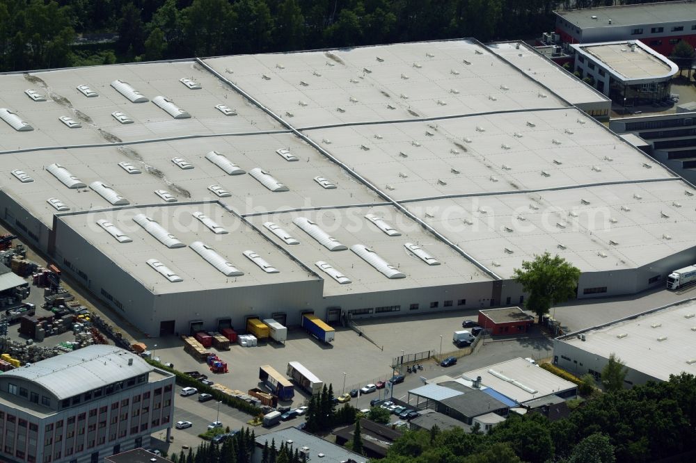 Garbsen from above - Building complex and grounds of the logistics center of Arvato Systems Bertelsmann in Garbsen in the state of Lower Saxony. The large logistics centre is part of the Arvato site in Garbsen. It is located in an industrial area on Alte Ricklingerstrasse