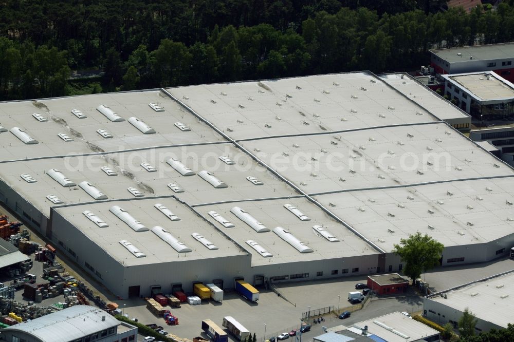 Garbsen from the bird's eye view: Building complex and grounds of the logistics center of Arvato Systems Bertelsmann in Garbsen in the state of Lower Saxony. The large logistics centre is part of the Arvato site in Garbsen. It is located in an industrial area on Alte Ricklingerstrasse