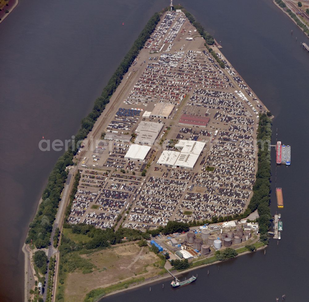 Hamburg from the bird's eye view: Premises of the distribution center of BLG Autoterminal Hamburg Gmbh&Co.KG with parking lots on the Kattwyk peninsula in Hamburg in Germany. The peninsula is located between Rethe and South Elbe rivers and in front of the borough of Altenwerder