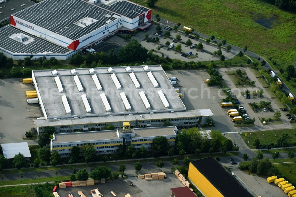 Hennigsdorf from the bird's eye view: Building complex and grounds of the logistics center Briefzentrum 13 on Walter-Kleinow-Ring in Hennigsdorf in the state Brandenburg, Germany