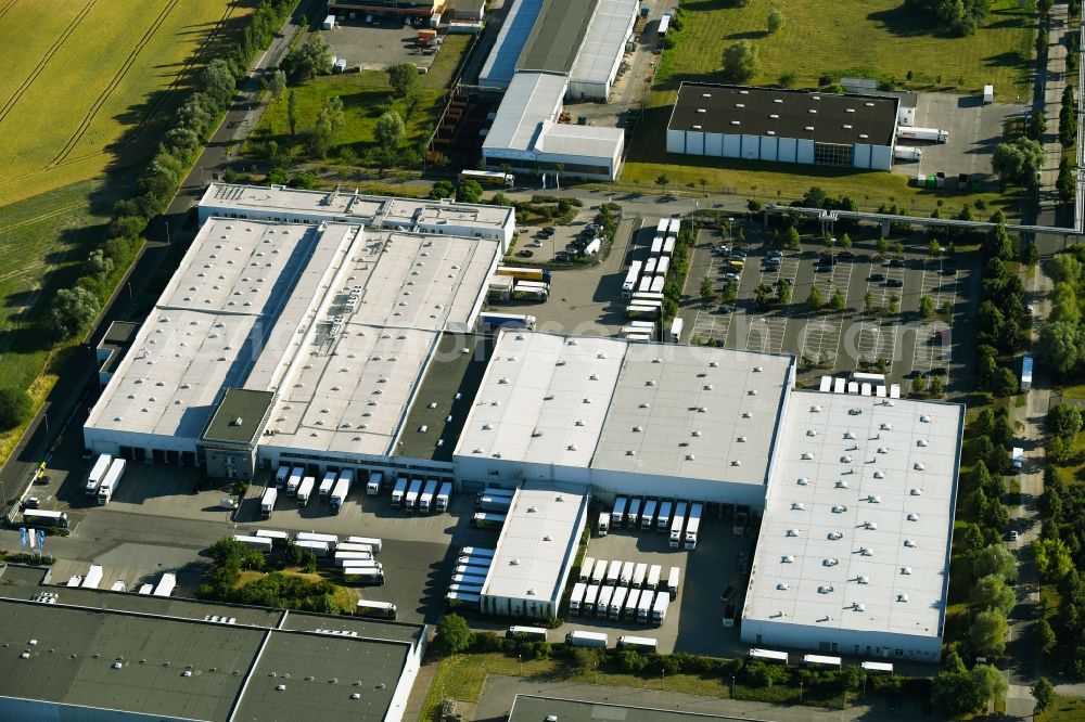 Neubrandenburg from the bird's eye view: Building complex and grounds of the logistics center of CHEFS CULINAR GmbH & Co. KG on Ernst-Abbe-Strasse in Neubrandenburg in the state Mecklenburg - Western Pomerania, Germany