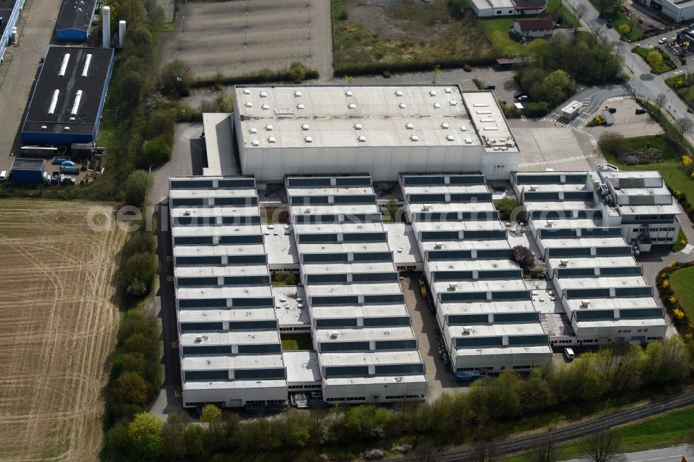 Einbeck from the bird's eye view: Building complex and grounds of the logistics center Deutsche Post Dialog Solutions GmbH - Lettershop on Hansestrasse in Einbeck in the state Lower Saxony