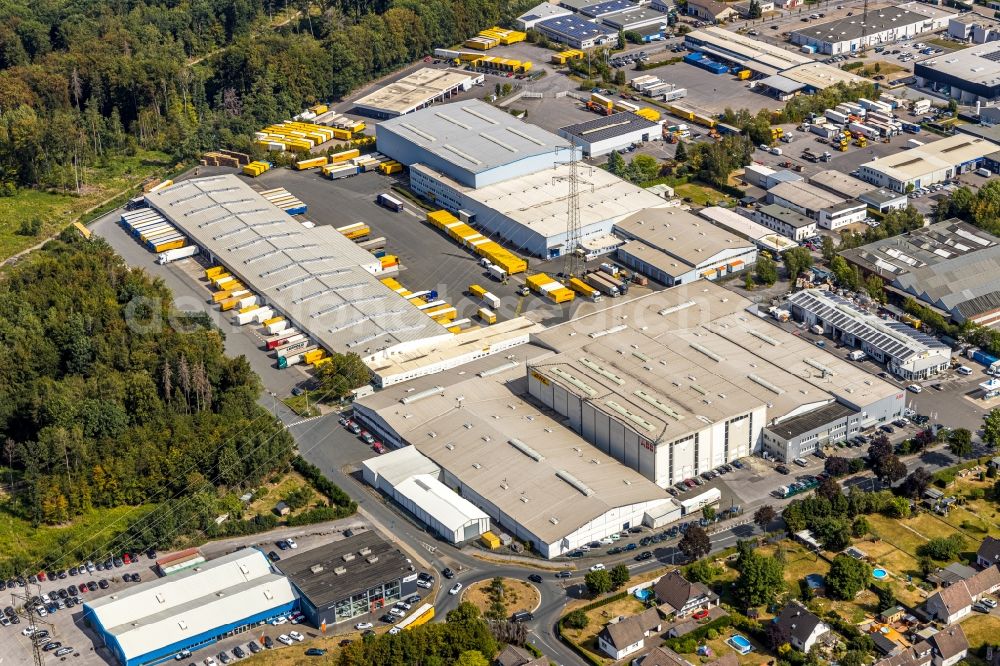 Menden (Sauerland) from above - Building complex and grounds of the logistics center of DHL Freight GmbH in Menden (Sauerland) in the state North Rhine-Westphalia, Germany