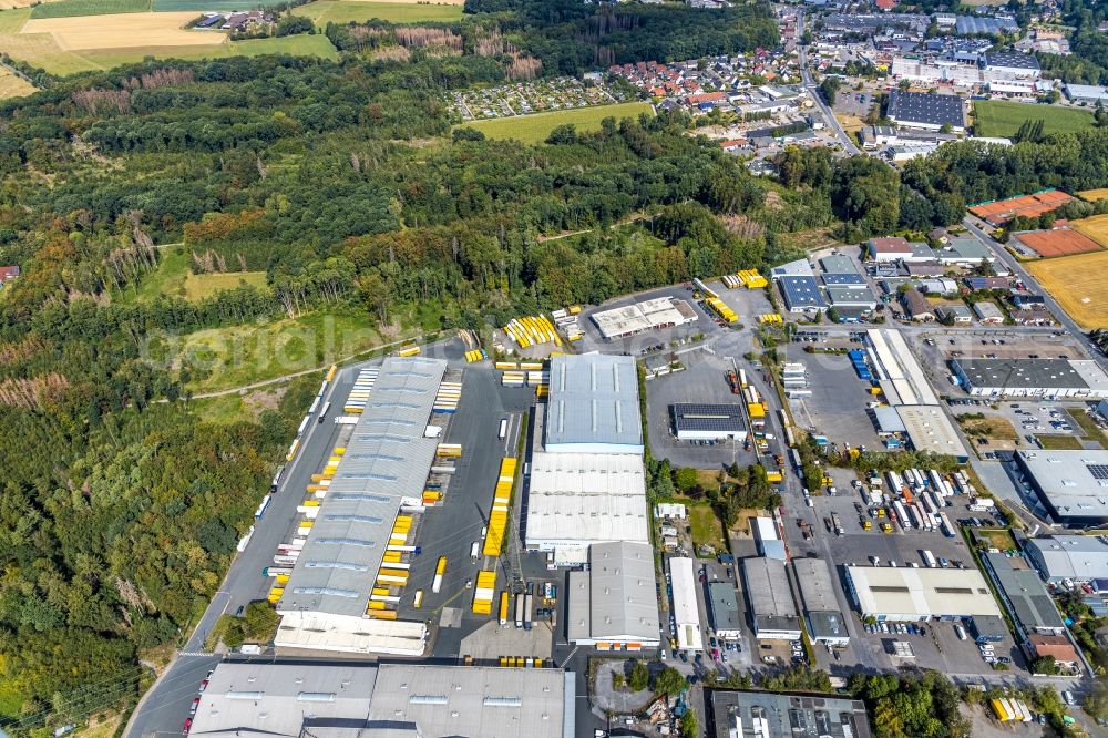 Menden (Sauerland) from the bird's eye view: Building complex and grounds of the logistics center of DHL Freight GmbH in Menden (Sauerland) in the state North Rhine-Westphalia, Germany