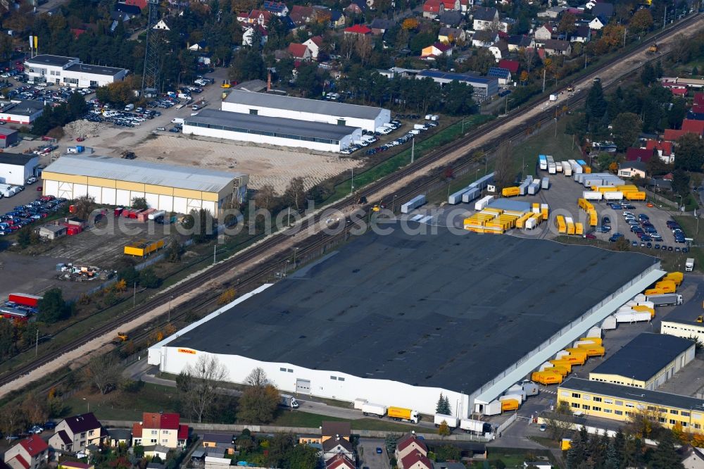 Oranienburg from above - Building complex and grounds of the logistics center of DHL GmbH in the district Sachsenhausen in Oranienburg in the state Brandenburg, Germany