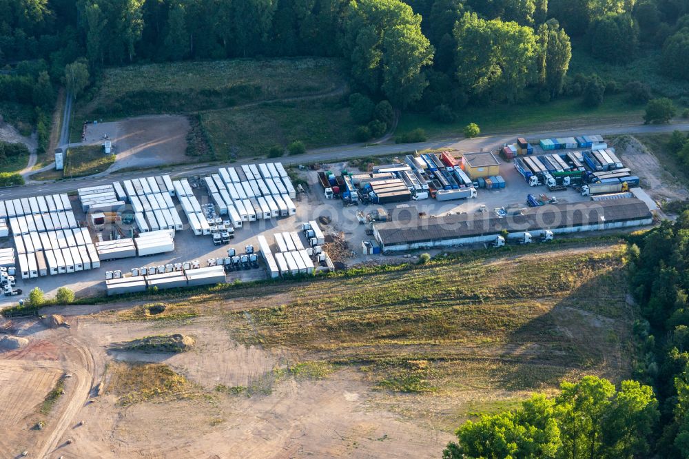 Aerial photograph Graben-Neudorf - Building complex and grounds of the logistics center HeKa Herzog GmbH on street Huttenheimer Landstrasse in Graben-Neudorf in the state Baden-Wuerttemberg, Germany