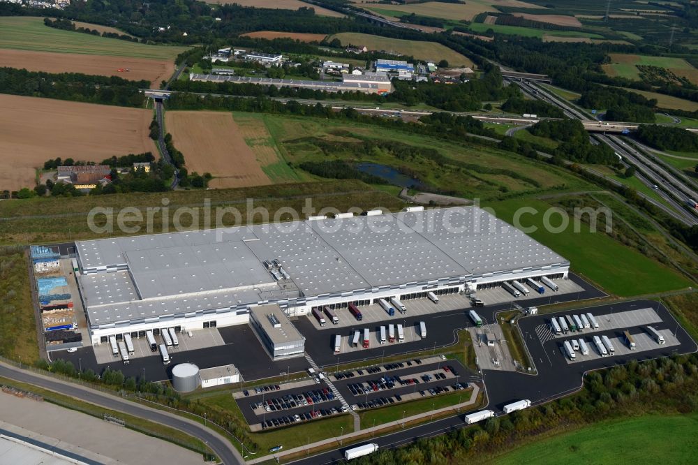 Koblenz from the bird's eye view: Building complex and grounds of the logistics center of LIDL Dienstleistung GmbH & Co. KG Am Autobahnkreuz in Koblenz in the state Rhineland-Palatinate, Germany