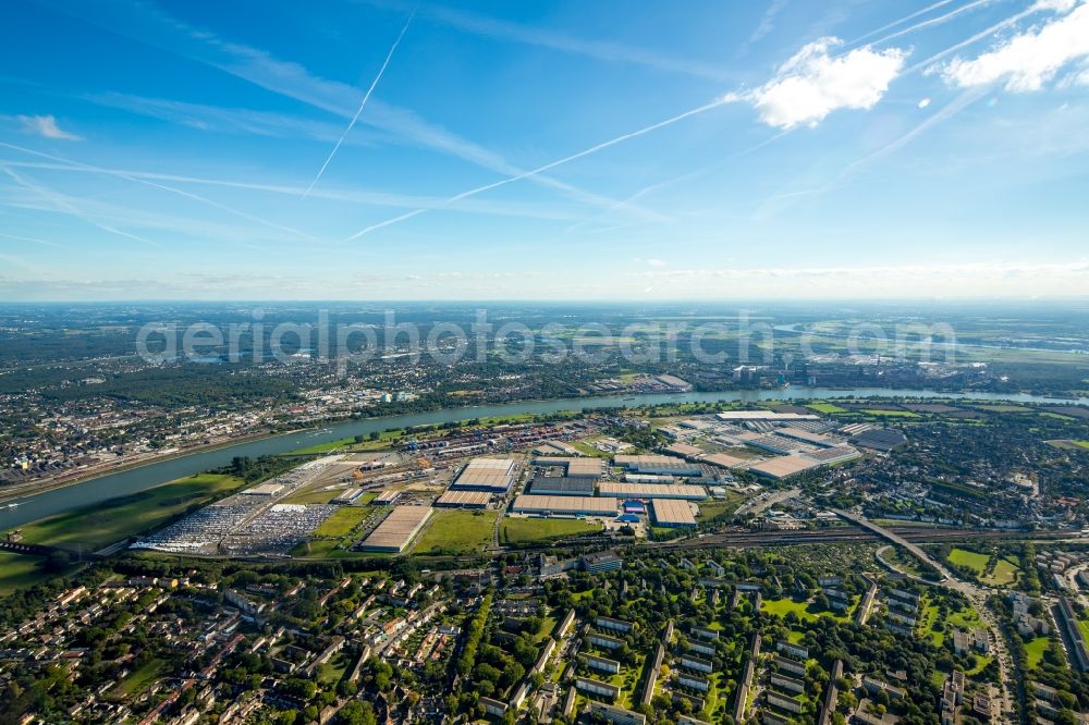 Duisburg from the bird's eye view: Building complex and grounds of the logistics center logport on the left riverbank of the Rhine in Duisburg in the state of North Rhine-Westphalia. The center is part of the harbour duisport and located in the Rheinhausen part of Duisburg