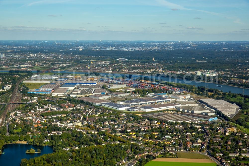 Aerial image Duisburg - Building complex and grounds of the logistics center logport on the left riverbank of the Rhine in Duisburg in the state of North Rhine-Westphalia. The center is part of the harbour duisport and located in the Rheinhausen part of Duisburg