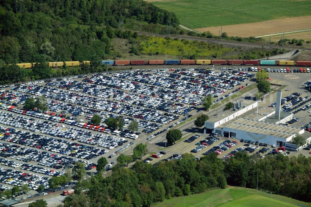 Illingen from the bird's eye view: Building complex and grounds of the logistics center Mosolf Horst GmbH & Co. KG on Wilhelmstrasse in Illingen in the state Baden-Wuerttemberg